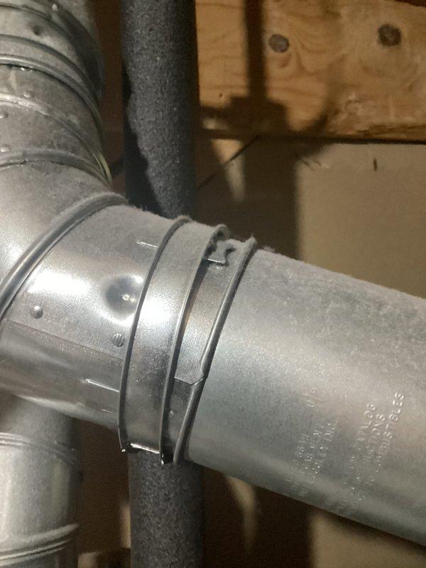 Responded to service call for 10-year-old Whirlpool 67-gallon water heater experiencing inadequate hot water delivery. Upon inspection, assessed existing tank-style water heater installation including copper supply lines, brass fittings, multi-port valve assembly, and proper insulation on hot water distribution piping. Documented current system configuration and mechanical connections. Photographed equipment condition, including galvanized tank exterior, plumbing connections, and associated HVAC ductwork in utility area to support replacement recommendation assessment.