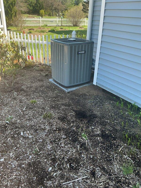 Returned to property to address refrigerant issue and level AC condenser pad. Evaluated outdoor condensing unit positioned against house on concrete pad, checked refrigerant charge and system pressures, and adjusted pad to ensure proper unit leveling for optimal drainage and compressor operation. Unit now sitting level on stable concrete base with proper clearances maintained.