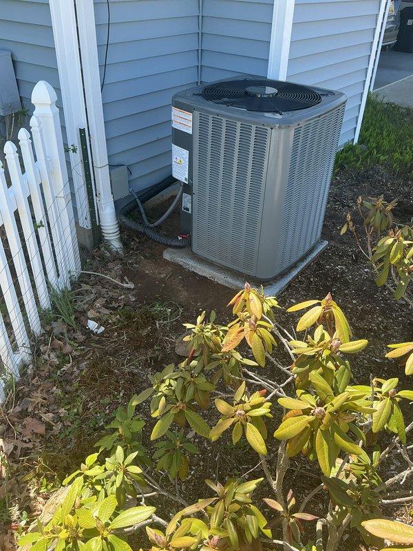 Returned to property to address refrigerant issue and level AC condenser pad. Evaluated outdoor condensing unit positioned against house on concrete pad, checked refrigerant charge and system pressures, and adjusted pad to ensure proper unit leveling for optimal drainage and compressor operation. Unit now sitting level on stable concrete base with proper clearances maintained.