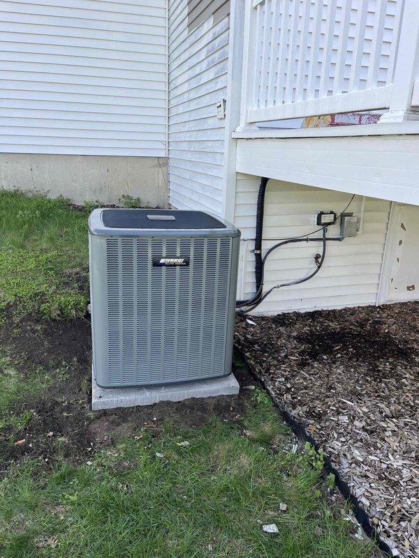 Completed full HVAC system installation including new air conditioning condenser unit and indoor air handler. Installed outdoor condenser on concrete pad with proper electrical disconnect and conduit routing along exterior wall. Connected refrigerant lines, established proper drainage, and integrated new equipment with existing furnace and ductwork system in mechanical room. Verified all electrical connections, tested system operation, and confirmed proper airflow throughout. Installation includes updated plenum connections and complete system startup with performance verification.