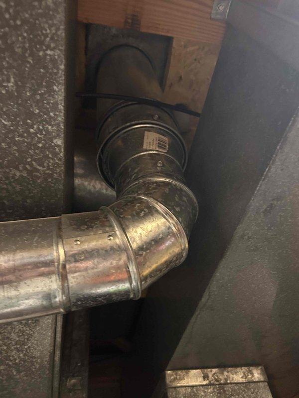 Conducted on-site evaluation for conversion from traditional tank-style water heater to tankless system. Assessed existing attic installation including current water heater location, copper supply lines, gas connections, and venting infrastructure. Documented existing HVAC ductwork configuration and spatial constraints to determine optimal placement and routing for new tankless unit installation.