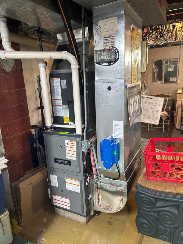 Successfully completed add-on air conditioning installation to existing forced-air heating system. Installed new outdoor condensing unit on concrete pad with proper clearances from building and landscaping, ran refrigerant lines and electrical conduit to interior equipment. Integrated new evaporator coil with existing furnace in basement mechanical room, connected to existing ductwork system to provide whole-home cooling capability.