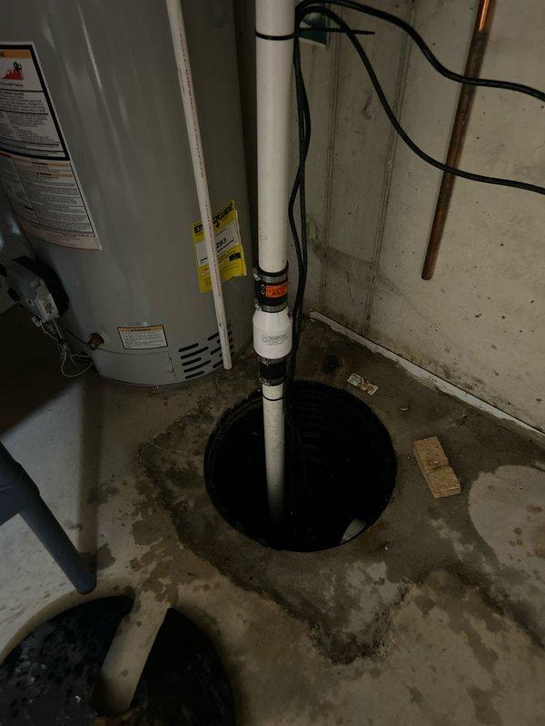 Responded to service request for gas line estimate to pool heater. Conducted on-site assessment of basement utility area to evaluate existing gas infrastructure and determine routing requirements for new gas line installation. Documented current plumbing and mechanical equipment layout, including water heater placement, sump pump system, and existing copper piping configuration. Photographed utility room conditions to support estimate preparation for proposed gas line extension work.
