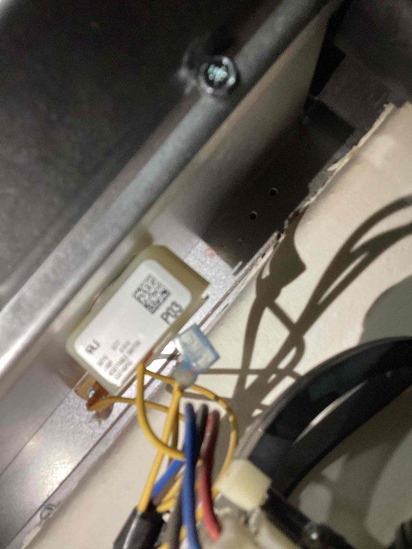 Responded to no heat call on 10-year-old Trane furnace. Upon arrival, confirmed unit was not producing heat and supply air temperature at room temperature. Inspected burner assembly and found pilot light/ignition system not functioning. Examined control board and wiring connections, discovering evidence of moisture intrusion and corrosion on primary control module and wire terminals. Brown discoloration visible on white plastic connector block indicated prolonged exposure to moisture. Cleaned corroded terminals, verified all wire connections were secure, and tested control board functionality. Cycled unit through heating sequence to confirm proper ignition, burner operation, and heat output. Verified supply air temperature rising appropriately and system operating as designed.