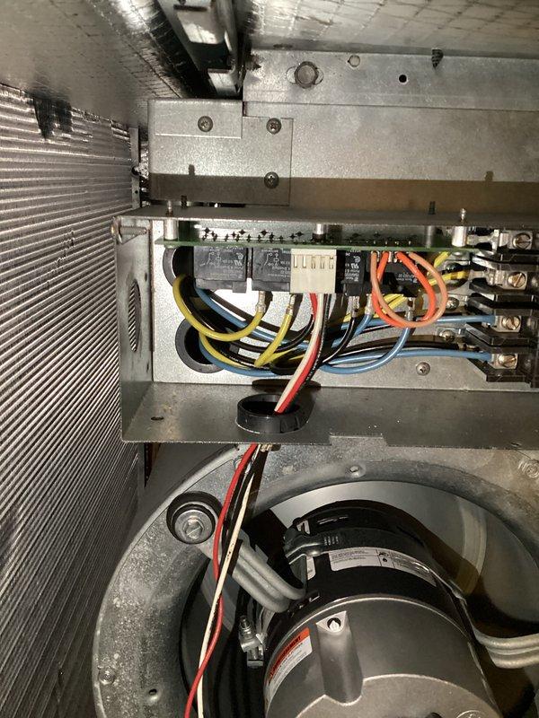 Completed annual geothermal tune-up and maintenance on two 14-year-old Climatemaster geothermal heat pump systems installed in 2012. Performed comprehensive inspection of both units including electrical control panels, contactors, relays, terminal connections, and blower motor assemblies. Verified proper operation of all components, checked wire connections and routing, and inspected heat exchanger coils. Both systems operating within normal parameters with no humidity control equipment present.