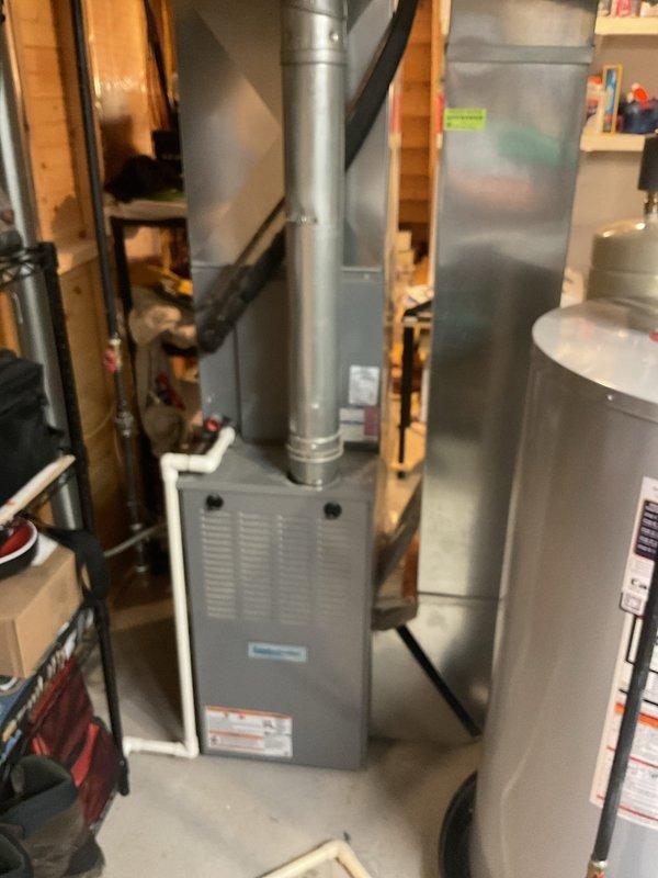 Responded to service call for outdoor air conditioning unit with breaker tripping issue and suspected seized compressor. Performed diagnostic inspection of condenser unit and electrical components, documenting equipment condition and installation configuration. Assessed system age, brand identification, and overall operational status to provide comprehensive evaluation for repair versus replacement options as requested for second opinion comparison.