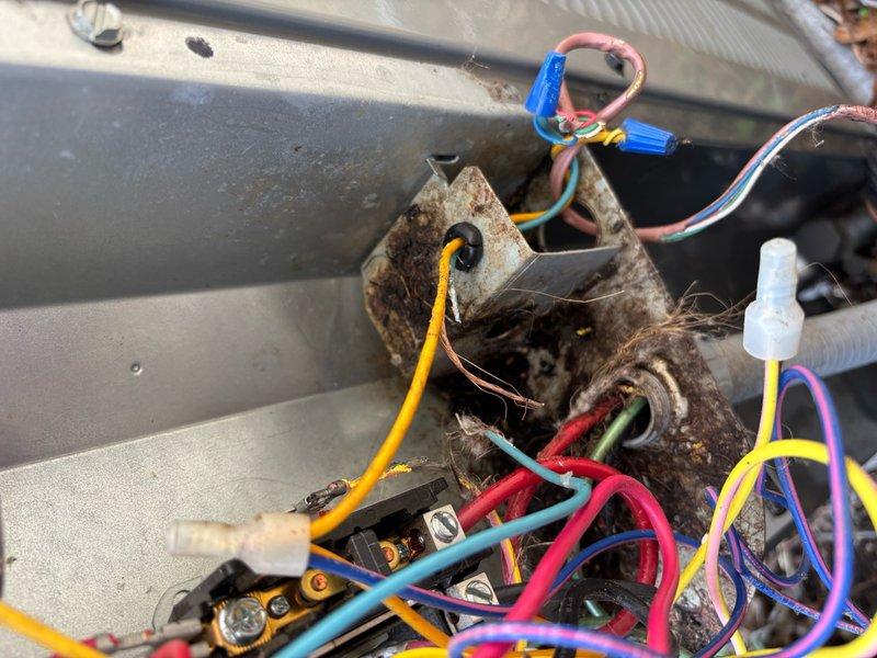 Responded to no power condition on 4-year-old EnergiAir system where customer had already replaced thermostat without resolution. Upon inspection, found extensive dirt and debris accumulation in control board area and wiring connections, along with significant rust and corrosion on mounting hardware near copper line set. Identified compromised low-voltage wiring connections due to environmental contamination affecting thermostat circuit continuity. Cleaned all wire terminals and junction points, removed debris from control board mounting area, verified proper voltage at transformer output, and restored power to thermostat and system. Tested all system functions and confirmed proper operation of heating and cooling cycles.
