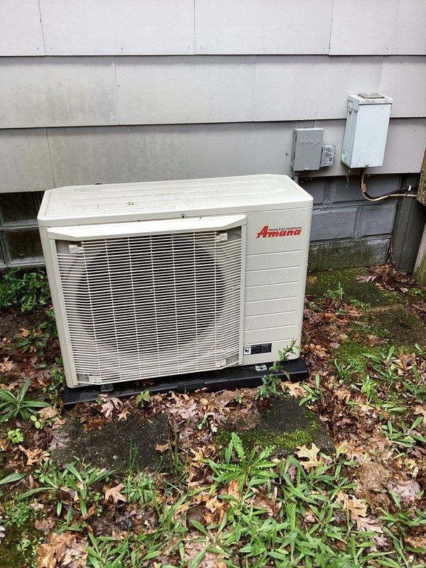 Completed annual cooling maintenance on Amana condenser unit as part of 2-year EnergiAir maintenance agreement. Inspected indoor air handler components in utility space, including transformer, electrical connections, and condensate drainage system. Performed exterior condenser inspection, verified proper operation of unit, checked refrigerant lines and electrical disconnect, and documented equipment condition with photos.