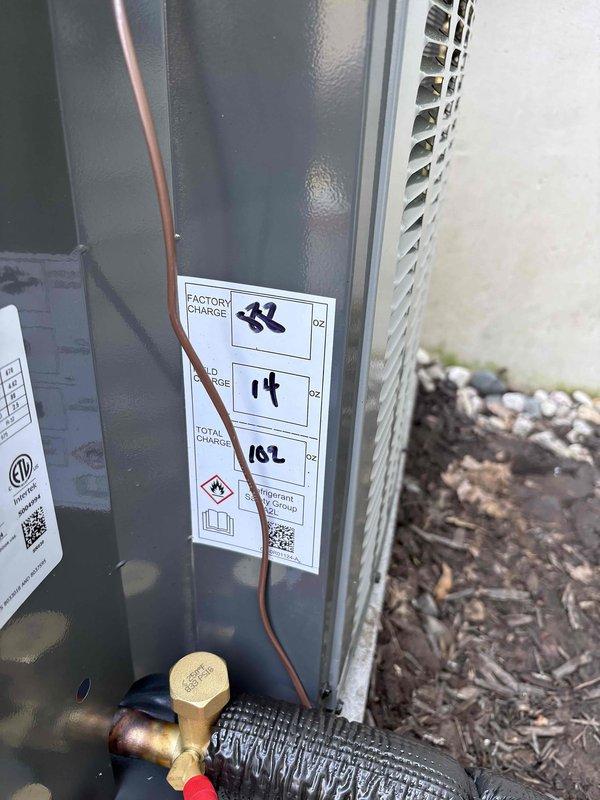 Completed full air conditioning system replacement including outdoor condensing unit and indoor air handler. Installed new refrigerant lines with proper insulation, connected copper piping with brass service valves, and charged system to manufacturer specifications per factory requirements. Verified all electrical connections, tested system operation, and confirmed proper airflow through existing ductwork integration.