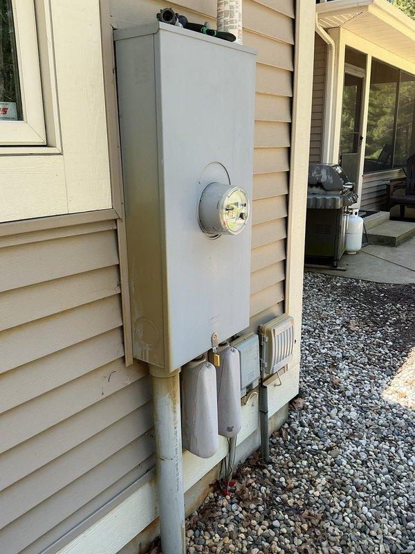 Conducted electrical estimate for installation of manual transfer switch at residential property. Assessed existing electrical service configuration including outdoor meter box, main electrical panel, and recently installed standby generator system. Evaluated equipment placement, conduit routing requirements, and necessary connections to integrate manual transfer switch between utility service, main panel, and backup generator to enable safe power source switching during outages.