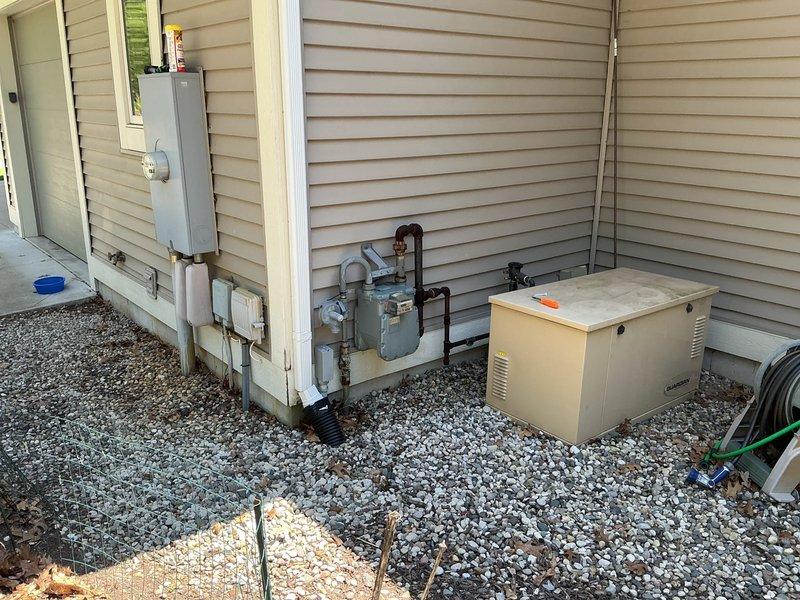 Conducted electrical estimate for installation of manual transfer switch at residential property. Assessed existing electrical service configuration including outdoor meter box, main electrical panel, and recently installed standby generator system. Evaluated equipment placement, conduit routing requirements, and necessary connections to integrate manual transfer switch between utility service, main panel, and backup generator to enable safe power source switching during outages.