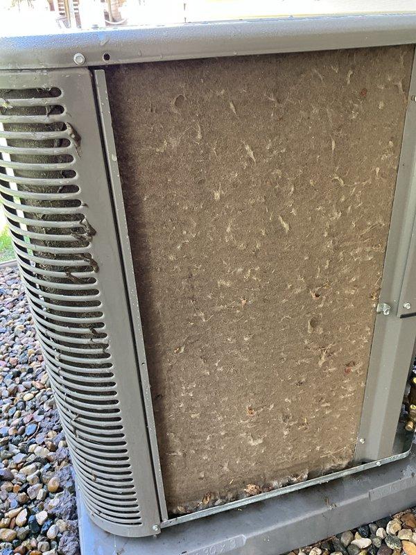 Completed annual cooling maintenance on 24-year-old Payne air conditioning system. Upon arrival, found condenser coil heavily clogged with dirt, dust, and debris accumulation, significantly restricting airflow and reducing system efficiency. Performed thorough coil cleaning to restore proper heat transfer and airflow capacity. Conducted standard tune-up procedures including refrigerant level check, electrical component inspection, and operational testing to ensure system readiness for cooling season.