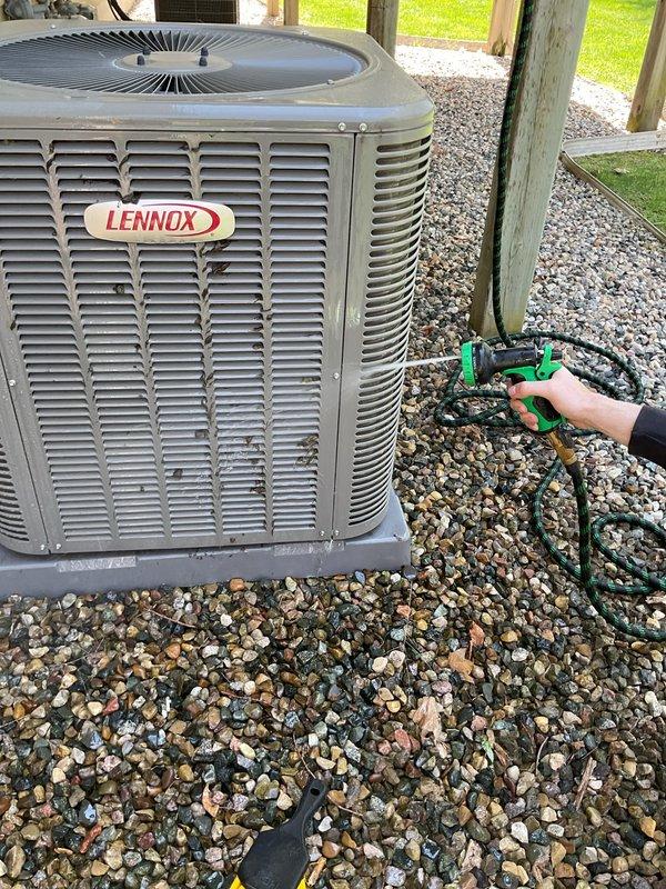 Completed annual cooling maintenance on 24-year-old Payne air conditioning system. Upon arrival, found condenser coil heavily clogged with dirt, dust, and debris accumulation, significantly restricting airflow and reducing system efficiency. Performed thorough coil cleaning to restore proper heat transfer and airflow capacity. Conducted standard tune-up procedures including refrigerant level check, electrical component inspection, and operational testing to ensure system readiness for cooling season.