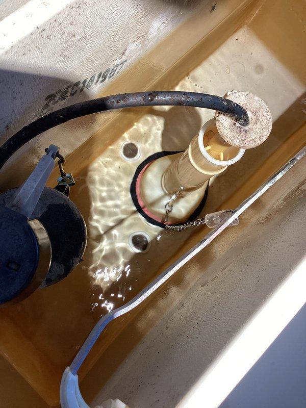Responded to service call for toilet that would not flush. Upon inspection, found the flush lever chain had become disconnected from the flapper valve inside the tank. Reconnected the chain to the flush lever arm and flapper mechanism, adjusted chain length for proper operation, and tested flush function multiple times to ensure reliable performance. Toilet now operates normally with full flush capability restored.