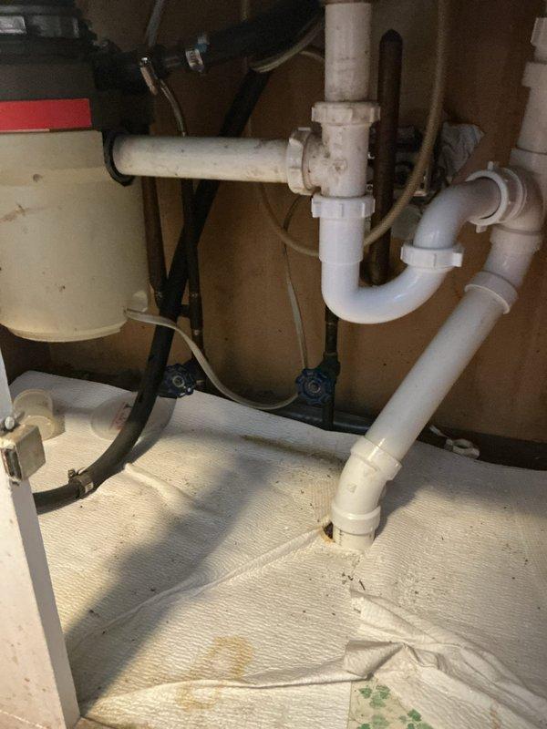 Responded to service call for kitchen sink with no water flow. Upon inspection, identified obstruction in supply line affecting water delivery to faucet. Disassembled plumbing connections under sink, cleared blockage from water supply system, verified proper flow through both hot and cold lines, reassembled all fittings, and tested fixture to confirm full restoration of water pressure and normal operation.