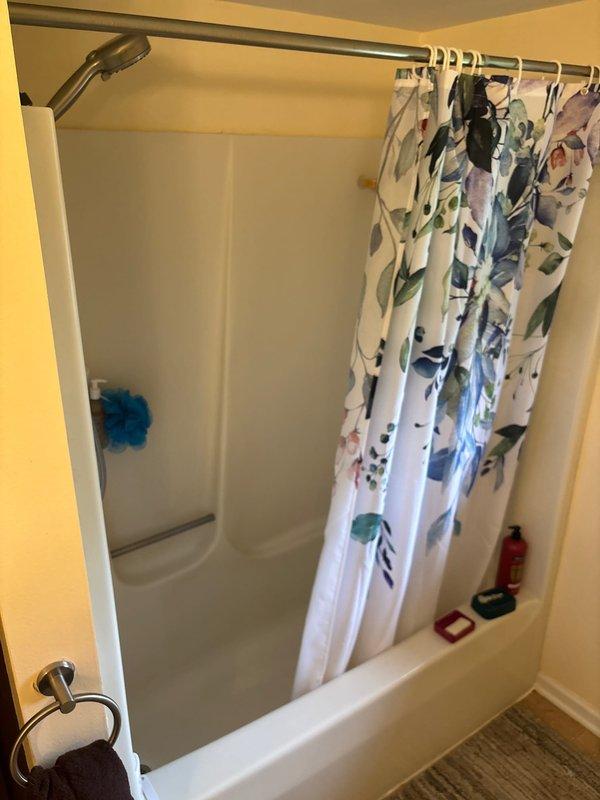 # Bathroom Remodeling Plumbing Estimate

Conducted comprehensive site assessment for complete bathroom remodeling project. Evaluated existing bathtub and shower combination with white fiberglass surround, chrome fixtures, and standard three-piece configuration. Assessed vanity area featuring oval undermount sink with chrome dual-handle faucet and dark espresso cabinetry with beige countertop. Documented current plumbing fixture conditions, wall preparations, and spatial layout to develop accurate scope of work for fixture replacement, potential reconfiguration of water supply lines, drain assemblies, and installation requirements for updated bathroom components.