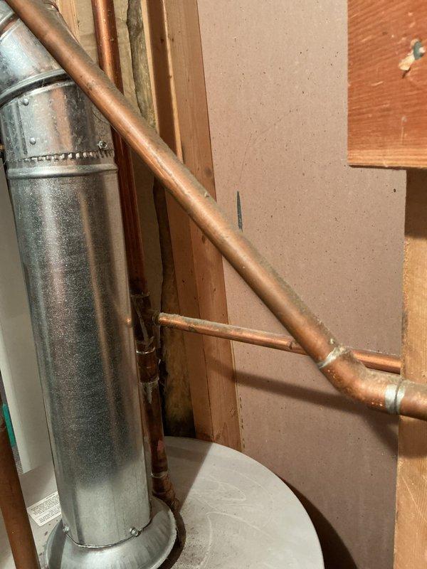 Responded to service call for 13-year-old water heater that would not maintain heating operation. Upon inspection, diagnosed failed thermocouple or gas control valve preventing pilot from staying lit. Performed necessary repairs to restore proper heating function and verified unit operation before completing service.