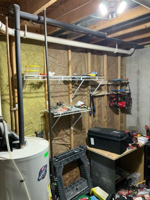 Conducted on-site evaluation of existing 16-year-old furnace and air conditioning system for replacement estimate. Inspected basement mechanical room installation, documenting current HVAC equipment configuration, electrical panel capacity and circuit availability, ductwork layout, and clearance requirements. Photographed existing water heater placement and utility connections to assess spatial considerations for new equipment installation. Reviewed electrical service panel to verify adequate breaker capacity for upgraded HVAC system requirements. Provided comprehensive replacement options and equipment recommendations for complete furnace and air conditioning system upgrade.