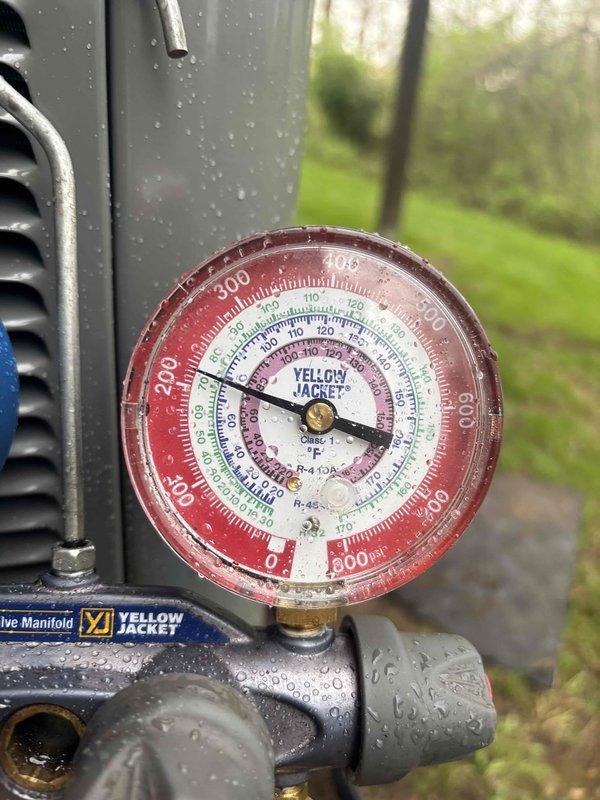Completed full AC system installation and replacement. System was properly charged with R-410A refrigerant, with pressures verified using manifold gauge set to ensure optimal performance within manufacturer specifications. All connections were tested and system commissioned successfully.