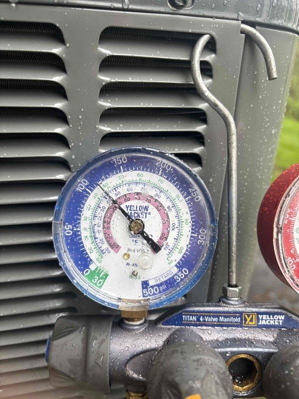 Completed full AC system installation and replacement. System was properly charged with R-410A refrigerant, with pressures verified using manifold gauge set to ensure optimal performance within manufacturer specifications. All connections were tested and system commissioned successfully.
