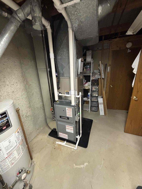 Completed no-charge estimate for installation of ARVT96060 air filtration system. Assessed existing HVAC equipment in basement mechanical room, including current furnace and air handler configuration. Documented installation location and verified compatibility with existing ductwork system. Photographed current setup showing furnace unit, PVC venting, and available mounting space for proposed air quality equipment.