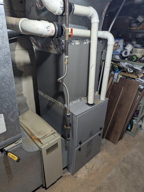 Responded to complaint of air conditioning unit freezing up after approximately twenty minutes of runtime on a three-year-old system. Upon inspection, diagnosed low refrigerant charge as primary cause of freeze-up condition. Performed system recharge to manufacturer specifications, verified proper operating pressures, and confirmed normal cooling cycle operation. Unit tested and returned to service with no further freezing observed.