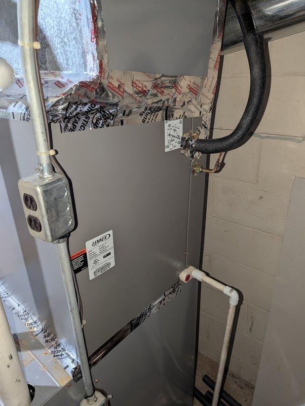 Responded to complaint of air conditioning unit freezing up after approximately twenty minutes of runtime on a three-year-old system. Upon inspection, diagnosed low refrigerant charge as primary cause of freeze-up condition. Performed system recharge to manufacturer specifications, verified proper operating pressures, and confirmed normal cooling cycle operation. Unit tested and returned to service with no further freezing observed.
