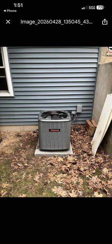 Completed full HVAC system installation including furnace, air conditioning unit, and water heater. Installed new outdoor AC condenser unit on concrete pad against exterior wall with proper electrical and refrigerant line connections. Installed new residential water heater in basement utility area with copper supply lines, PVC venting, expansion tank, and safety drip pan, ensuring all connections meet code requirements and manufacturer specifications.