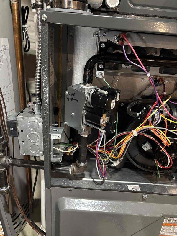 Returned to property with correct replacement gas valve for furnace repair. Removed access panel and disconnected wiring from failed gas valve assembly. Installed new gas valve, reconnected all electrical connections including thermostat wiring, and secured component in place. Verified proper operation of heating system and restored unit to service.
