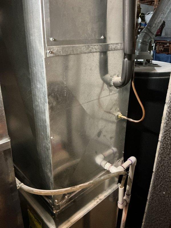 Completed comprehensive AC Super Tune-up on 15-year-old system. Removed significant accumulation of leaves and organic debris from outdoor unit enclosure, inspected electrical connections and refrigerant lines, verified proper system operation, and documented equipment condition with photos. All components functioning within normal parameters upon completion.