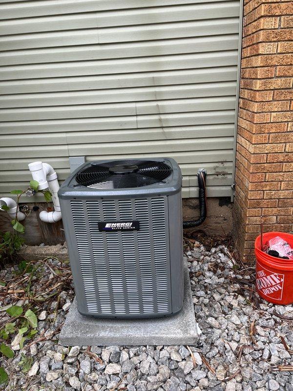 Completed add-on air conditioning installation to existing Armstrong furnace system. Installed outdoor condensing unit on concrete pad with proper gravel base and drainage, connected refrigerant lines through exterior wall, and integrated evaporator coil with existing forced air system. Installed condensate pump, PVC drainage piping, electrical disconnect, and all associated ductwork to provide complete cooling capacity to the home.