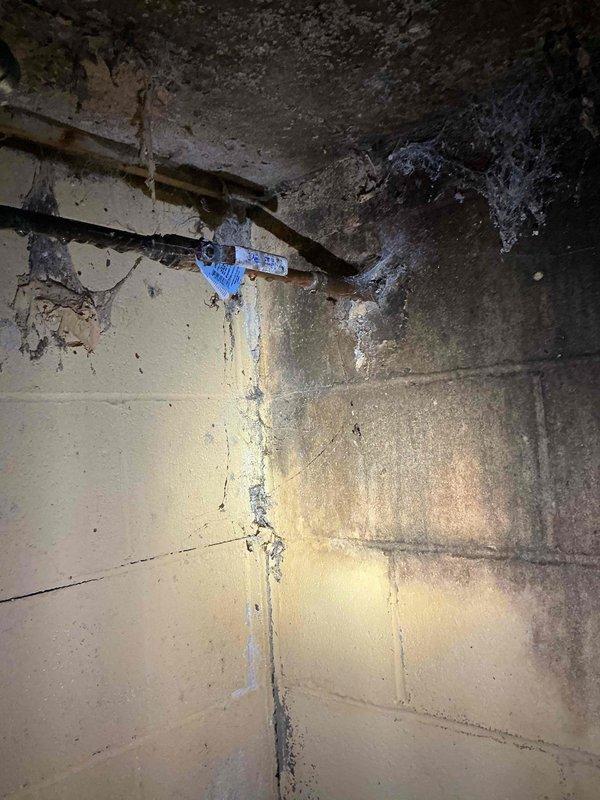 Responded to customer report of outdoor faucet that was difficult to shut off in a 1950s-era home. Upon inspection, accessed the interior shut-off valve located in the basement utility area. Replaced worn valve stem and repaired the hose bib assembly. Applied pipe thread sealant and secured all connections. Tested the outdoor faucet for proper operation, confirming smooth handle operation and complete water shut-off with no leaks. Faucet now functions properly with normal turning resistance.