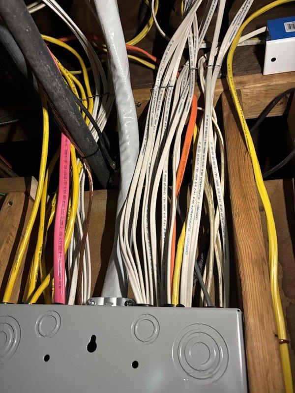 Responded to service call for Carrier system displaying 01 error code following recent circuit breaker installation. Inspected outdoor condenser unit and electrical connections at both exterior disconnect and interior panel. Diagnosed error code related to electrical configuration issue stemming from new breaker work. Corrected wiring connections, verified proper voltage supply to unit, and cleared fault code. System tested successfully with normal operation restored.