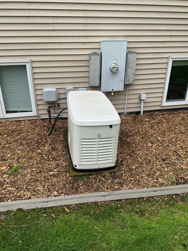 Conducted site assessment for standby generator upgrade at residential property. Current two-year-old generator unit is operational but customer requires larger capacity system to meet increased power demands. Evaluated existing installation including concrete pad, electrical connections, meter socket, and associated panels to determine compatibility with upgraded unit. Documented current setup and discussed potential relocation of existing generator to alternate residence. Photographed existing generator placement, electrical infrastructure, conduit routing, and available installation space for sizing and proposal preparation.