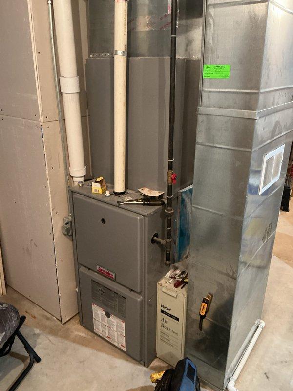 Completed annual cooling maintenance on 16-year-old ICP air conditioning system. Performed comprehensive tune-up including inspection of furnace unit, ductwork connections, and associated HVAC components in basement mechanical room. All systems evaluated and found operating within normal parameters for continued seasonal use.