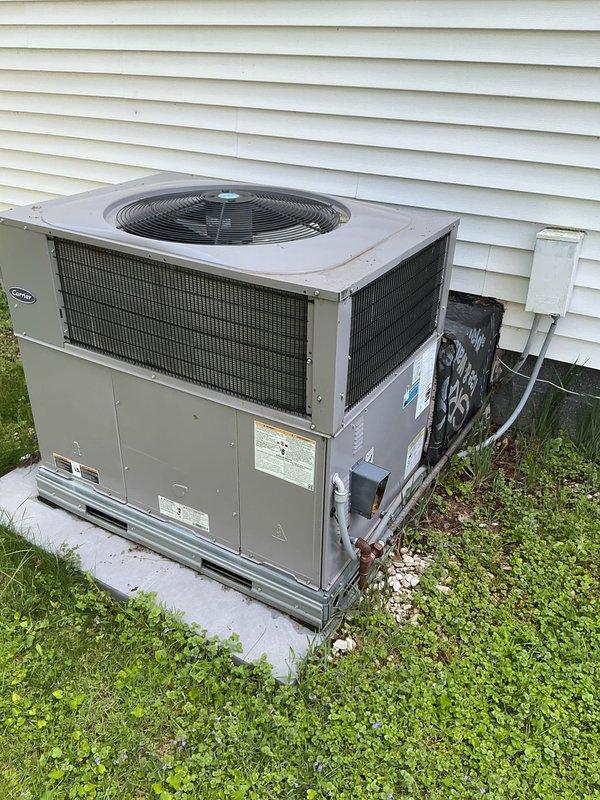 # No Heat Service Call - Carrier Packaged Unit

Responded to no heat call on Carrier packaged HVAC system (approximately 5 years old) that failed to start following a power outage. Upon arrival, performed visual inspection of outdoor packaged unit and found system non-operational.

Opened electrical control panel and discovered significant contamination from dirt, debris, and insect nesting material (mud dauber nests) throughout the interior. Debris was concentrated around electrical connections, contactors, and control components, which prevented proper system operation after power restoration.

Cleaned all electrical components, terminals, and control board area, removing insect nests and accumulated debris. Inspected all wire connections and found them secure after cleaning. Verified contactor operation and checked all safety circuits. 

Restored power to unit and successfully cycled system through startup sequence. Confirmed proper heating operation with all safeties functioning co