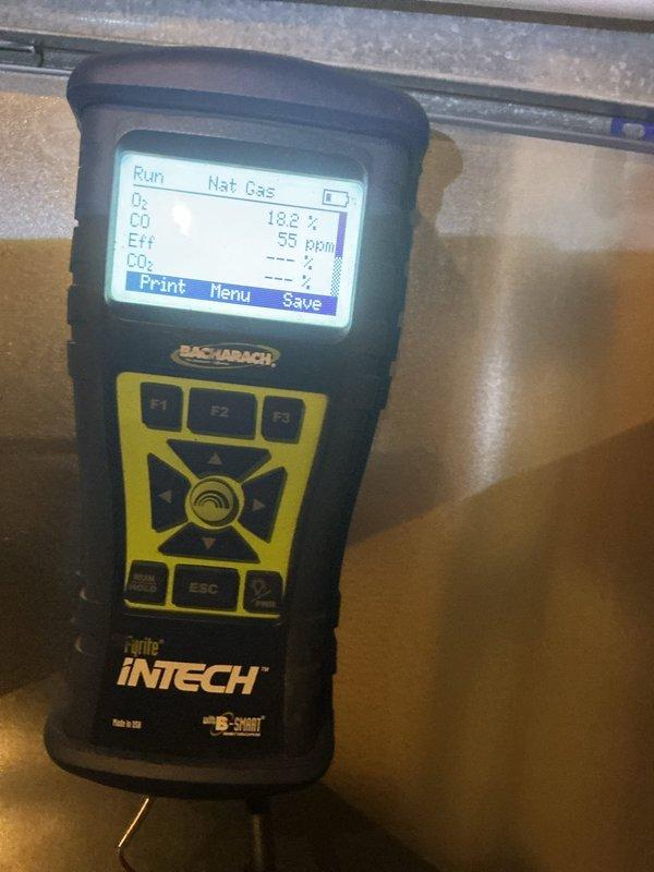 Responded to no heat call on heat pump system with thermostat set to 67°F but reading 63°F. Accessed furnace cabinet and inspected internal components including blower motor assembly, wiring connections, and heat exchanger. Performed combustion analysis testing using digital analyzer, which revealed readings of 182% efficiency and 55 ppm CO levels. Verified proper operation of heating system and restored unit to normal heating function.