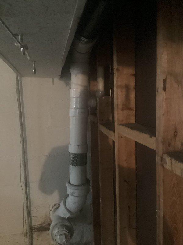 Rebuilt tub drain assembly and replaced complete waste and overflow system. Installed new PVC drain piping through floor joists with proper fittings and connections to ensure code-compliant drainage. All components tested and verified operational upon completion.
