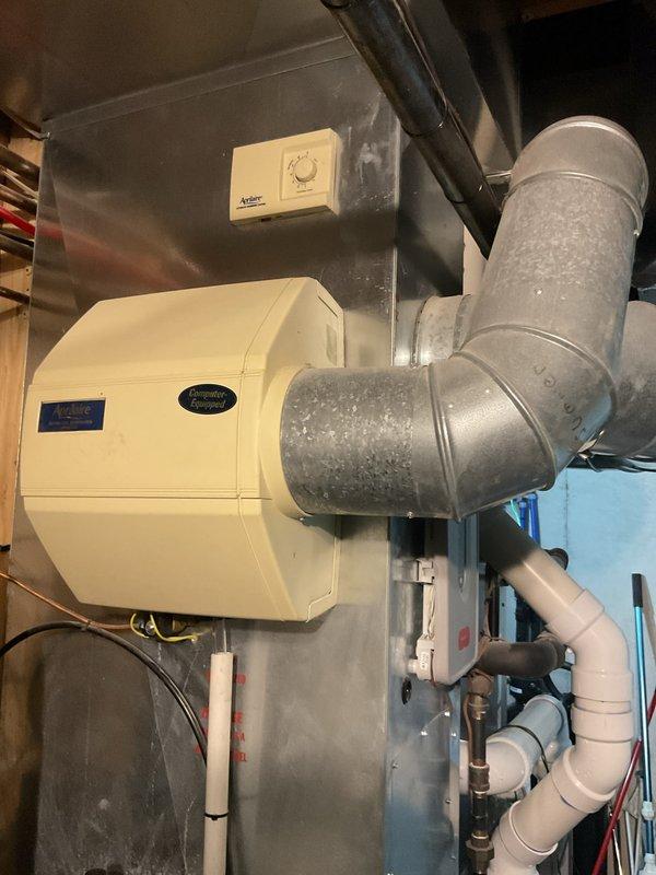 Completed annual furnace tune-up for Comfort Club member on 9-year-old EnergiAir unit with warranty valid through September 2026. Performed comprehensive inspection and maintenance of heating system including humidifier unit mounted to supply plenum, verified all ductwork connections and airflow, and confirmed proper operation of all HVAC components and controls.
