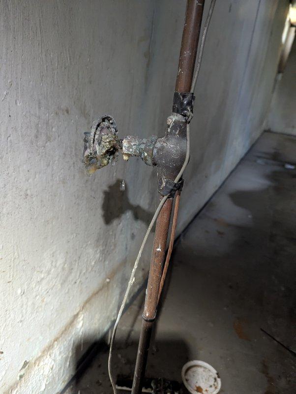 Completed QUOTR-quoted repair involving control board replacement in utility area. Assessed and photographed existing plumbing infrastructure showing aged copper piping with mineral deposits and corroded valve fixtures. Successfully replaced faulty control board, restoring system functionality within the estimated one-hour timeframe.