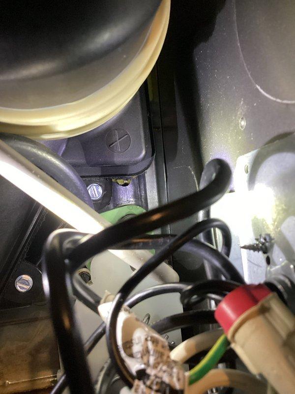 Responded to water leak complaint on 3-year-old Carrier unit with worsening leak condition since previous repair. Performed thorough inspection of internal components, drainage system, and evaporator coil assembly. Documented findings with detailed photographs of interior compartment showing electrical connections, mechanical components, and evidence of water staining on base panels indicating ongoing moisture intrusion.