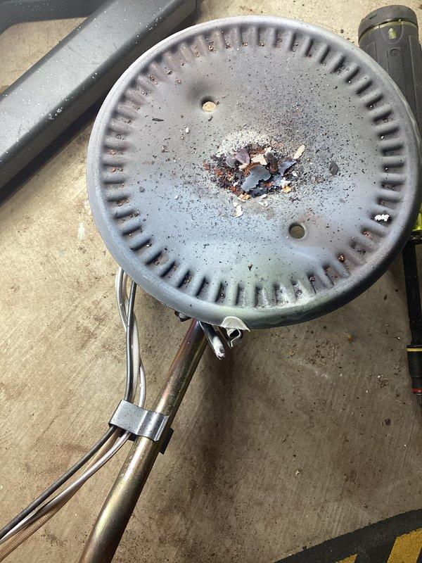 Responded to service call for General Electric Smart Water Heater Model SG50T12AVH00 with pilot light failure. Upon inspection of the 19-year-old unit, diagnosed faulty thermocouple assembly preventing pilot flame from remaining lit. Removed and replaced defective thermocouple and pilot assembly. Cleaned burner compartment of accumulated debris and dust. Tested gas valve operation and verified proper pilot flame characteristics. Cycled unit through multiple ignition sequences to confirm reliable pilot light operation and proper main burner ignition. Unit restored to normal operating condition with pilot light remaining lit and water heater functioning as designed.
