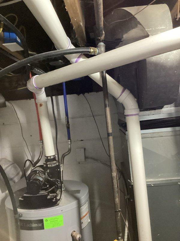 Responded to service call for 10-year-old water heater not producing hot water. Upon inspection, diagnosed failed heating element and performed complete water heater replacement due to age and condition of unit. Installed new water heater with proper venting and PVC plumbing connections, ensuring all joints were properly primed and secured. Tested system operation and verified hot water production restored to normal functionality.