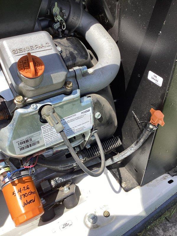 # Generator and AC Maintenance Service

Responded to service call for 9-year-old Generac generator that failed to start during power outage and displayed red fault light. Performed comprehensive generator tune-up including inspection of engine compartment, fuel system, gas regulator, and electrical connections. Verified proper operation of all mechanical components, checked battery condition, and tested automatic transfer switch functionality. Cleared fault codes and confirmed generator starts and runs properly under load.

Additionally completed air conditioning system tune-up as requested. Inspected outdoor condensing unit, refrigerant lines, and associated plumbing connections. Noted corrosion on copper refrigerant lines consistent with outdoor exposure. Checked refrigerant pressures, electrical connections, and mounting hardware. Verified proper operation of AC system and documented equipment condition with photographs for service records.