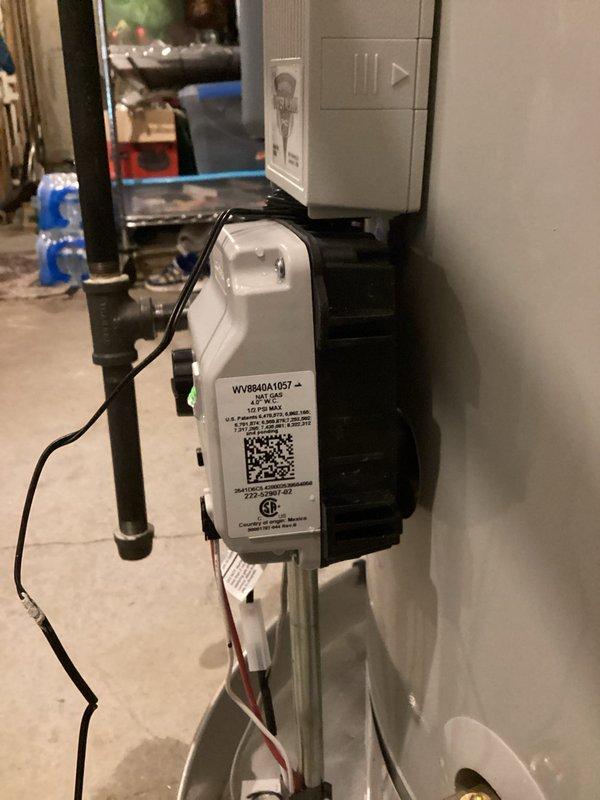 Technician completed initial diagnostic work on HVAC system and identified gas valve requiring replacement. Heavy frost accumulation observed on refrigeration components indicating potential temperature control or refrigerant flow issues. Gas valve swap scheduled for follow-up visit along with additional system repairs to restore proper operation.
