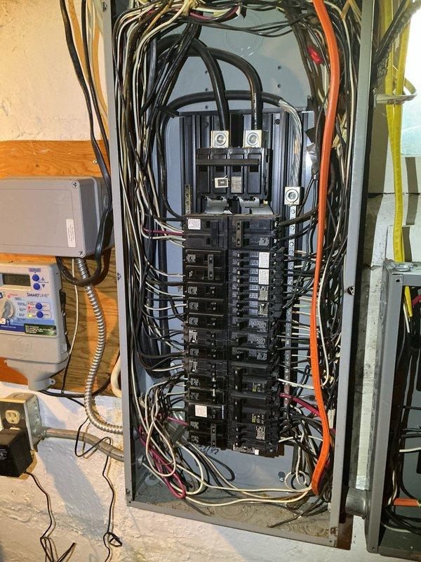 Responded to service call for multiple non-functioning outlets throughout residence and complete power loss to garage. Upon arrival, performed systematic diagnostic evaluation of electrical distribution system. Inspected main electrical panel and verified proper operation of all circuit breakers, main disconnect, and bus bar connections. Tested individual branch circuits serving affected areas using voltage meter to isolate fault locations. Identified tripped breaker supplying garage and multiple interior outlet circuits. Reset affected breakers and verified restoration of power to all previously non-functional outlets and garage electrical system. Conducted load testing on restored circuits to confirm proper amperage and verify no underlying short circuits or ground faults present. Inspected wire terminations at panel for signs of loose connections, overheating, or deterioration - all connections found secure with no visible damage. Verified proper wire sizing and circuit protection r