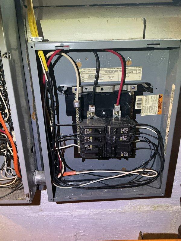 Responded to service call for multiple non-functioning outlets throughout residence and complete power loss to garage. Upon arrival, performed systematic diagnostic evaluation of electrical distribution system. Inspected main electrical panel and verified proper operation of all circuit breakers, main disconnect, and bus bar connections. Tested individual branch circuits serving affected areas using voltage meter to isolate fault locations. Identified tripped breaker supplying garage and multiple interior outlet circuits. Reset affected breakers and verified restoration of power to all previously non-functional outlets and garage electrical system. Conducted load testing on restored circuits to confirm proper amperage and verify no underlying short circuits or ground faults present. Inspected wire terminations at panel for signs of loose connections, overheating, or deterioration - all connections found secure with no visible damage. Verified proper wire sizing and circuit protection r