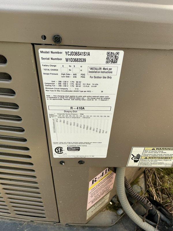 Responded to no cooling complaint with unit freezing up. Previous contractor diagnosed evaporator coil leak and recommended full system replacement due to R22 refrigerant. Upon inspection, confirmed York furnace with 2-year-old evaporator coil paired with outdoor condensing unit model YCJD36S41S1A utilizing R-410A refrigerant. Documented equipment specifications and current system configuration with photos for assessment and recommendations.
