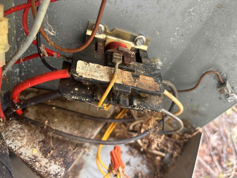 Completed annual cooling maintenance on 16-year-old AC system. Performed comprehensive tune-up including inspection of electrical components, contactors, and refrigerant lines. Documented existing equipment condition with photos showing significant corrosion on contactor assembly and age-related wear on copper refrigerant piping. System operational upon completion with club membership valid through 2025.