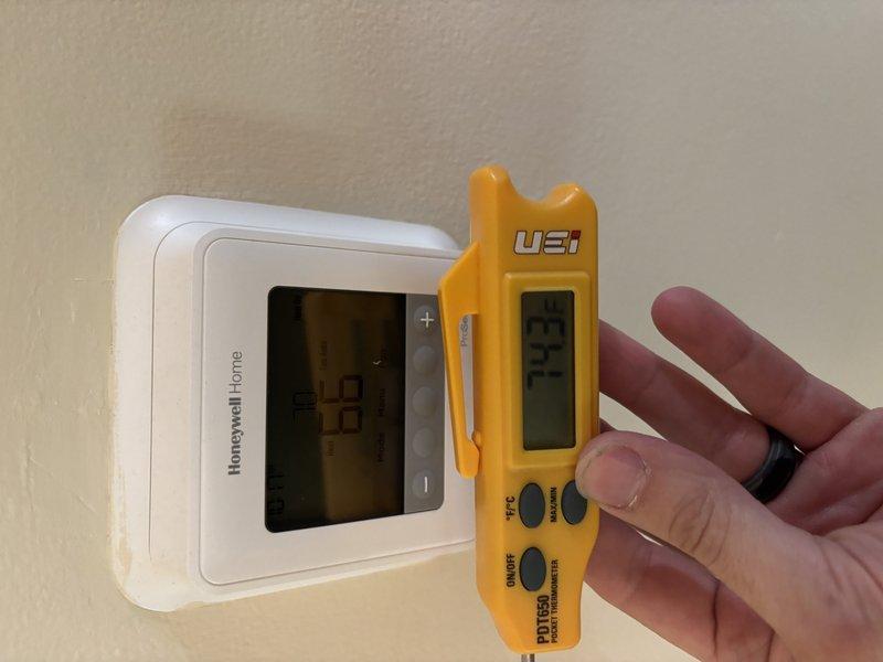 Completed complimentary annual cooling maintenance on Payne AC system as part of 5-year maintenance agreement. Performed system diagnostics including thermostat calibration verification using digital testing equipment, confirming proper temperature readings and control functionality. Inspected and documented electrical connections at control board, verifying all low-voltage wiring terminations, color-coded wire routing, and compression fittings for secure connections and proper system operation.